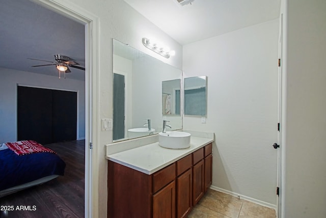 bathroom featuring vanity and ceiling fan