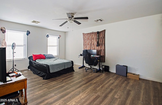 bedroom featuring dark wood-type flooring and ceiling fan