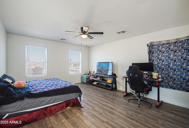 bedroom featuring dark hardwood / wood-style floors and ceiling fan