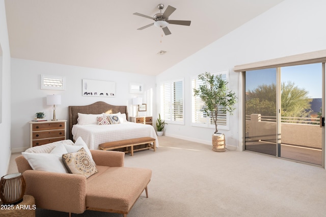 carpeted bedroom featuring ceiling fan, lofted ceiling, and access to exterior