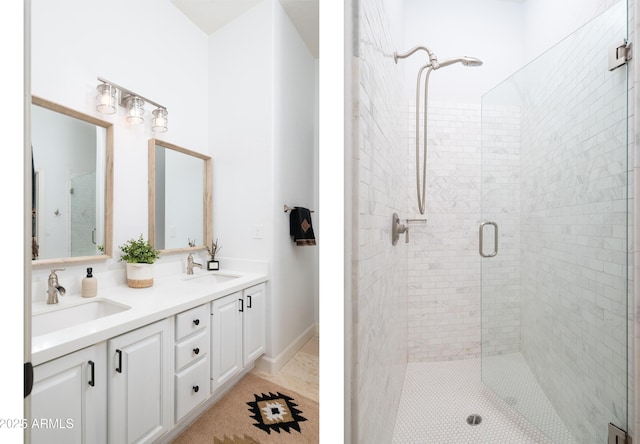 bathroom featuring tile patterned floors, vanity, and an enclosed shower