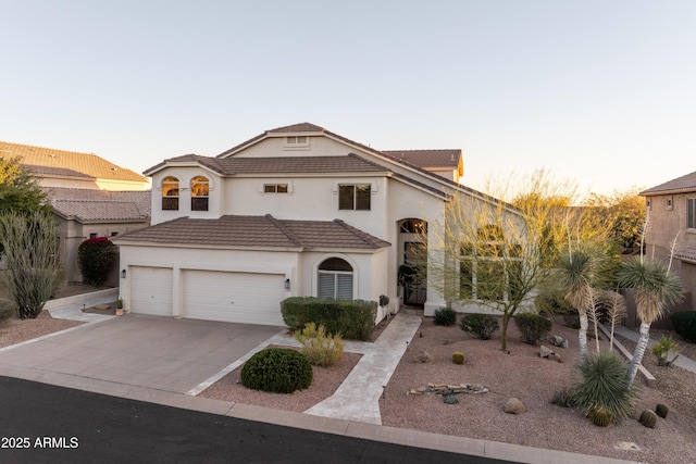 view of front of house with a garage