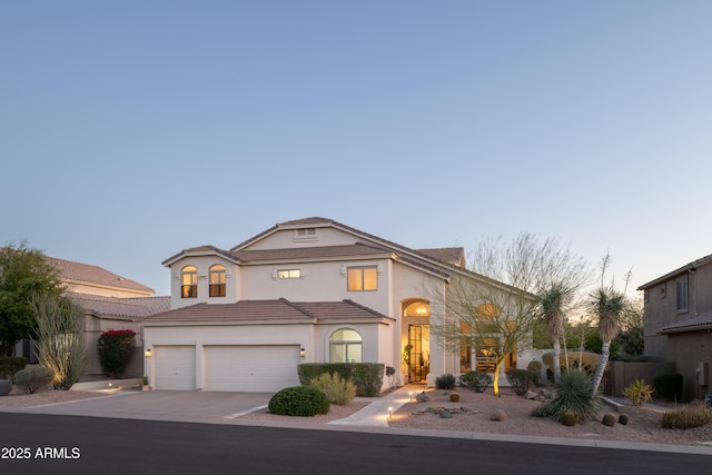 view of front of property with a garage