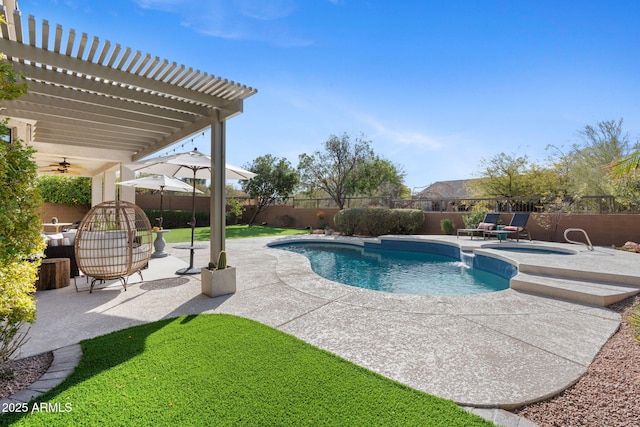 view of swimming pool with a yard, a pergola, and a patio area