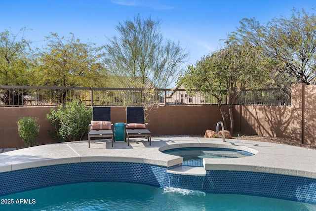 view of pool featuring an in ground hot tub and a patio area