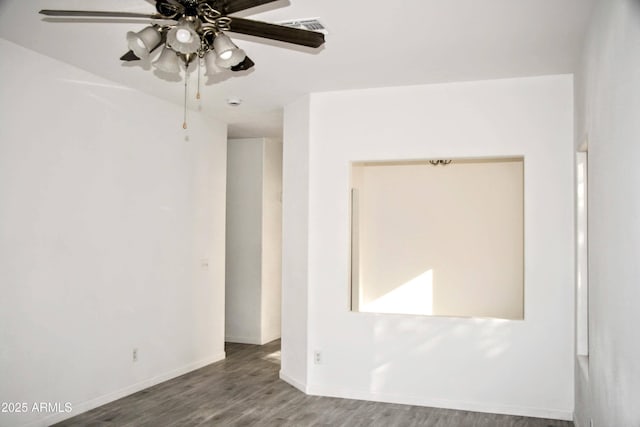 unfurnished room featuring ceiling fan and wood-type flooring