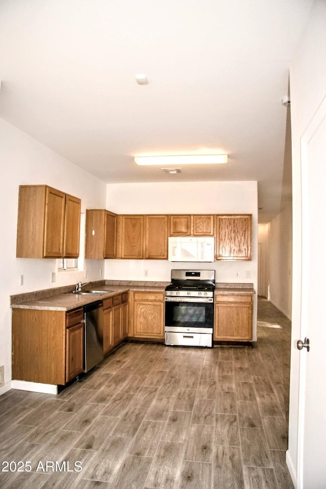 kitchen with sink and stainless steel appliances