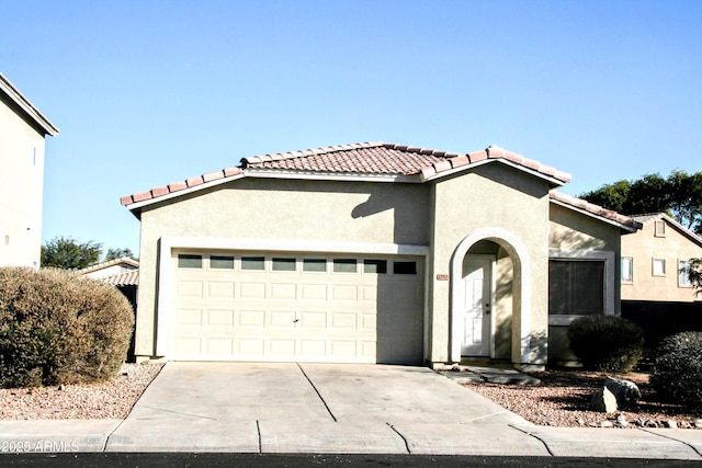 view of front of property featuring a garage