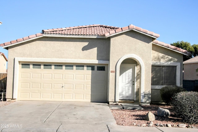 view of front of property featuring a garage