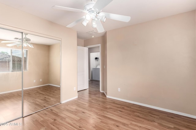 10 N 87th Dr, Tolleson, AZ 85353 - unfurnished bedroom with light wood-type flooring, a closet, baseboards, and ceiling fan