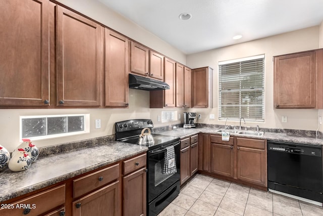 10 N 87th Dr, Tolleson, AZ 85353 - kitchen featuring black appliances, under cabinet range hood, a sink, dark countertops, and light tile patterned floors