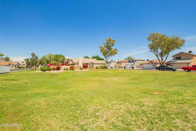 view of yard with a residential view