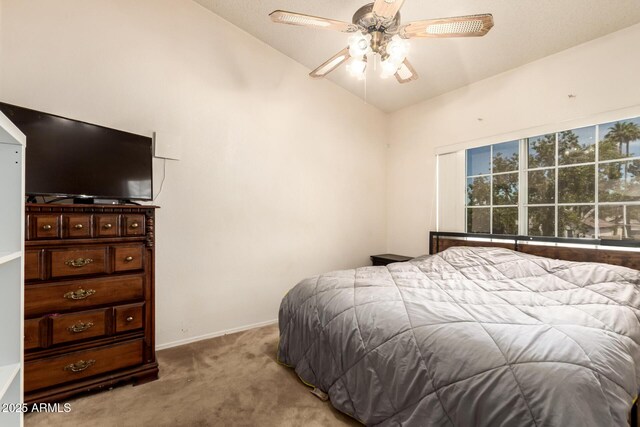 bedroom with baseboards, carpet flooring, ceiling fan, and high vaulted ceiling