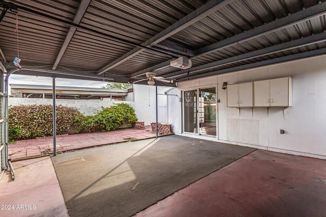 view of patio featuring ceiling fan