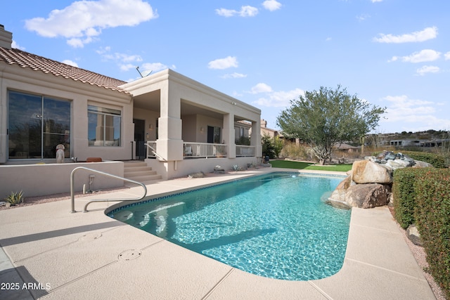 view of pool with a patio area