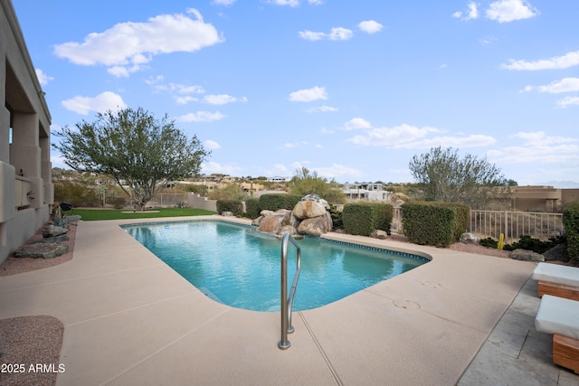 view of swimming pool with a patio