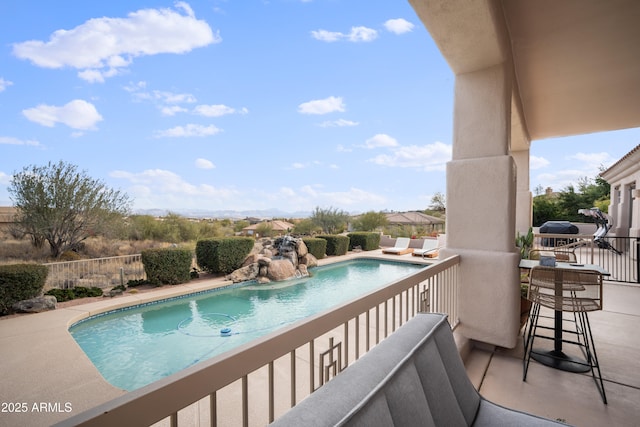 view of pool featuring a patio area