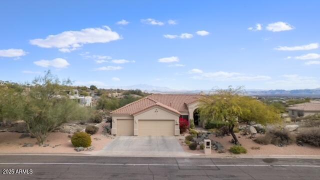 view of front of property featuring a garage