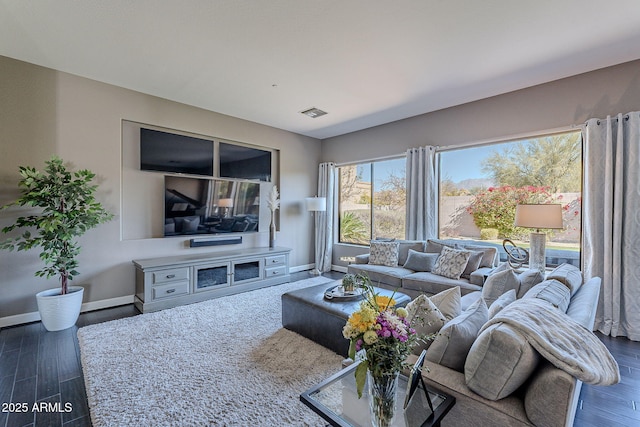 living room with dark hardwood / wood-style flooring