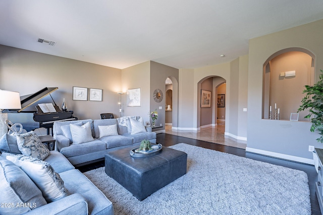 living room featuring dark hardwood / wood-style flooring