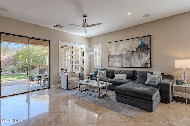 living room featuring ceiling fan