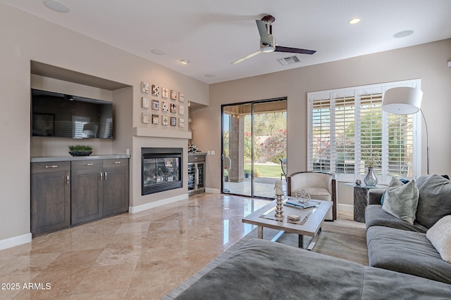 living room with ceiling fan