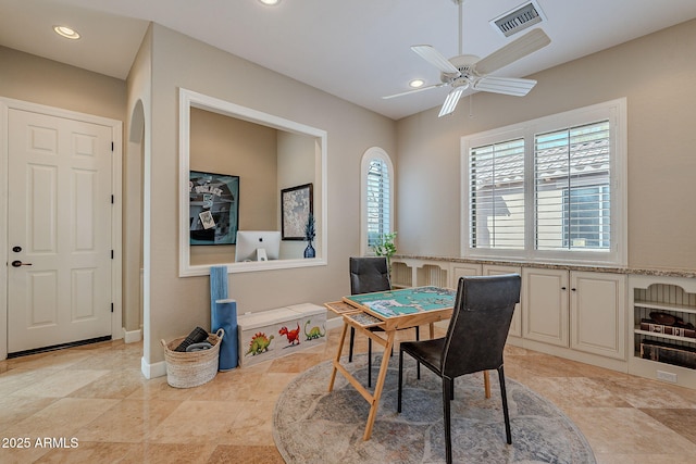 dining area featuring ceiling fan