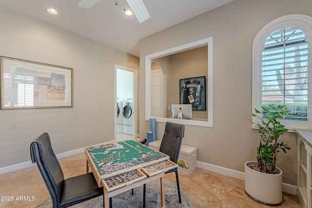 tiled dining room featuring ceiling fan and independent washer and dryer