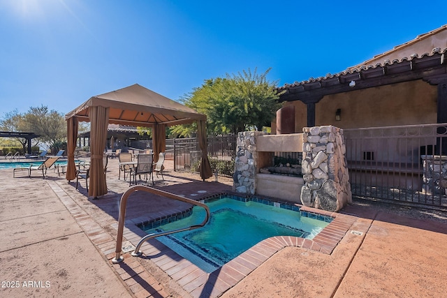 view of pool with a gazebo and a patio area