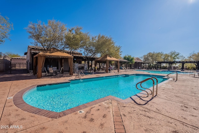 view of pool with a gazebo and a patio