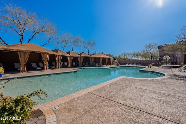 view of pool featuring a gazebo and a patio area