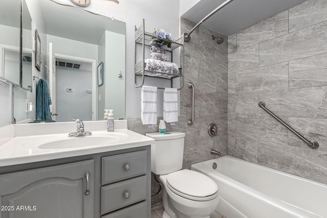 5221 W Garden Dr, Glendale, AZ 85304 - bathroom with toilet, shower / bath combination, vanity, and visible vents