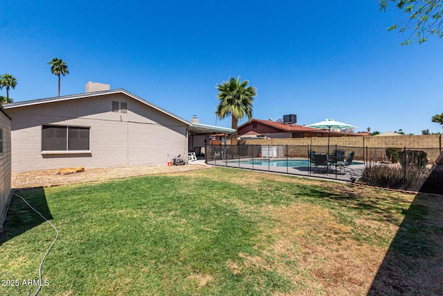 5221 W Garden Dr, Glendale, AZ 85304 - view of yard with a patio area, fence, and a fenced in pool