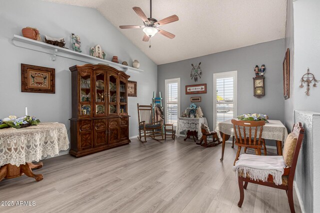 5221 W Garden Dr, Glendale, AZ 85304 - dining space with light wood-type flooring, vaulted ceiling, and ceiling fan