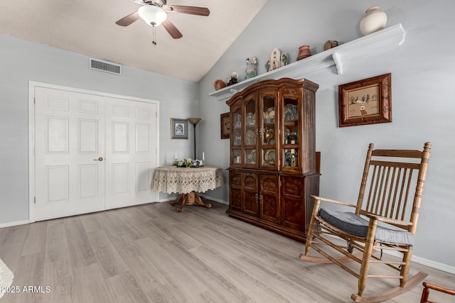 5221 W Garden Dr, Glendale, AZ 85304 - sitting room with ceiling fan, visible vents, lofted ceiling, light wood finished floors, and baseboards