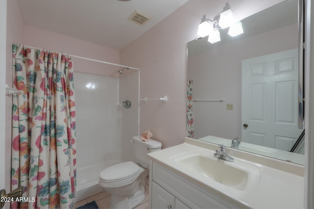 bathroom with vanity, tile patterned floors, toilet, and a shower with shower curtain