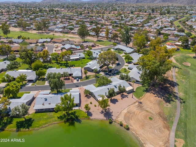 bird's eye view with a residential view and a water and mountain view