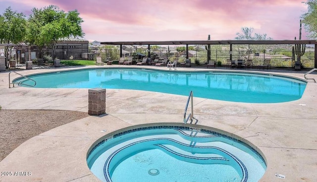 pool featuring a patio and fence