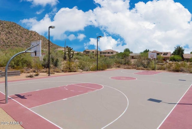 view of basketball court with community basketball court