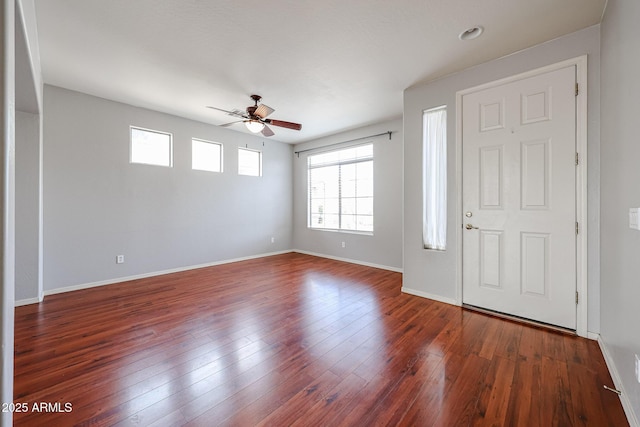 entryway with ceiling fan, baseboards, and hardwood / wood-style flooring