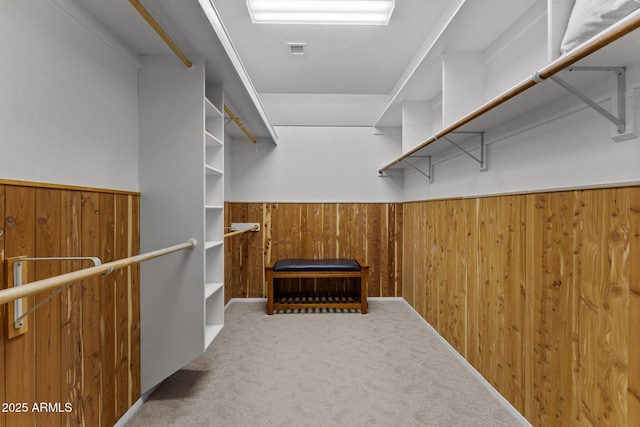 spacious closet featuring carpet and visible vents