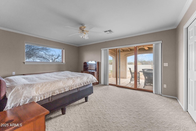 carpeted bedroom featuring visible vents, ornamental molding, a ceiling fan, baseboards, and access to exterior