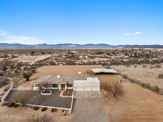 bird's eye view featuring a mountain view and a desert view