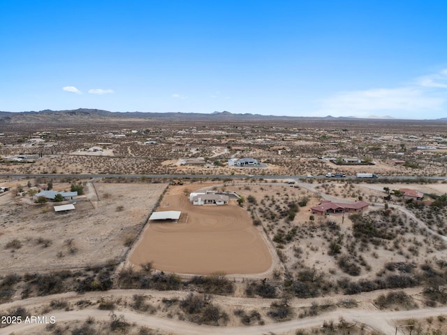 aerial view with view of desert and a mountain view