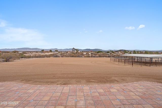 view of patio / terrace with a mountain view