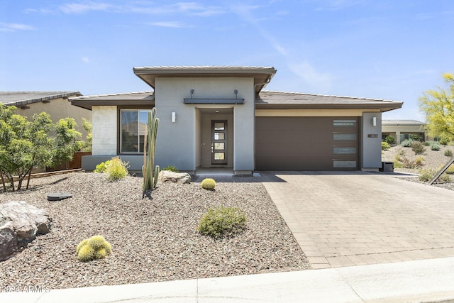 prairie-style home with a garage