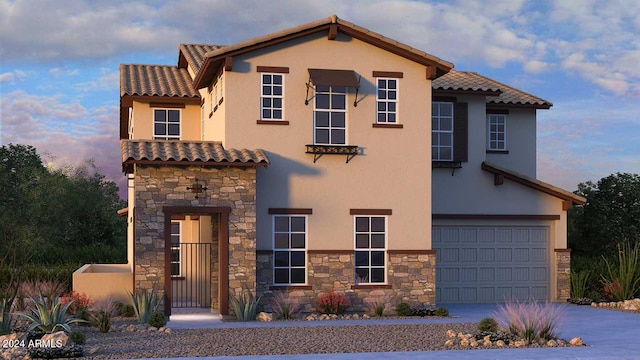 mediterranean / spanish-style home with stone siding, concrete driveway, an attached garage, and stucco siding