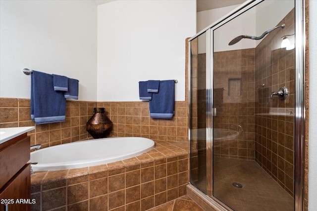 11640 N Tatum Blvd Unit 3091, Phoenix, AZ 85028 - full bath featuring vanity, a stall shower, and a garden tub