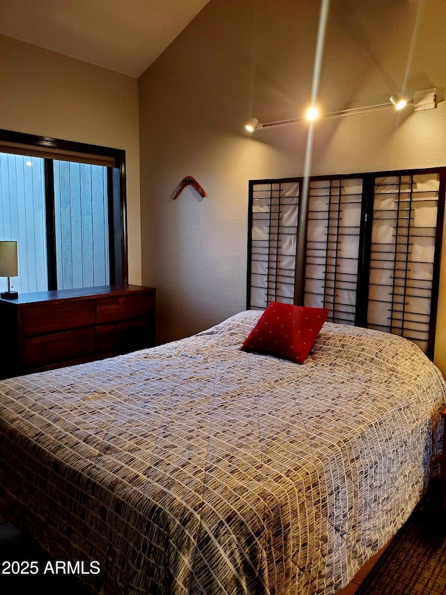 bedroom with a textured wall