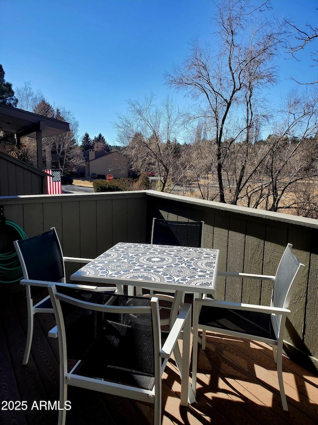 balcony featuring outdoor dining space